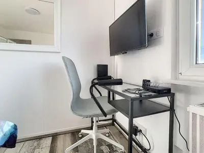 Télévision ou salle de divertissement dans l'établissement Studio 8 - proche tram, Bâle, autoroute