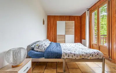 Un ou plusieurs lits dans un hébergement de l'établissement Amazing Home In Saulxures-Sur-Moselott