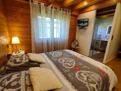 Un ou plusieurs lits dans un hébergement de l'établissement L'Eclipse -12p, vue lac au pied des pistes et SPA