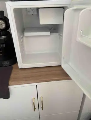 Cuisine ou kitchenette dans l'établissement Appart Melvyn Chanael - proche gare