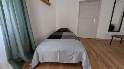 Un ou plusieurs lits dans un hébergement de l'établissement Maison 110m2, 7 Lits, Pro & Famille