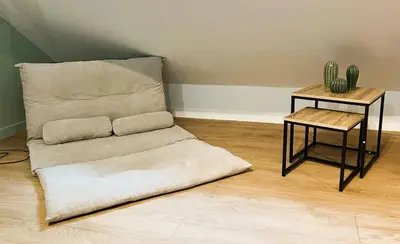Coin salon dans l'établissement RB-3 Charmant appartement 2 pers dans les combles 3ème étage