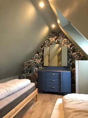 Un ou plusieurs lits dans un hébergement de l'établissement Le duplex de l ancienne forge