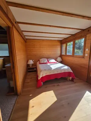 Un ou plusieurs lits dans un hébergement de l'établissement Chalet Familial Cosy et moderne