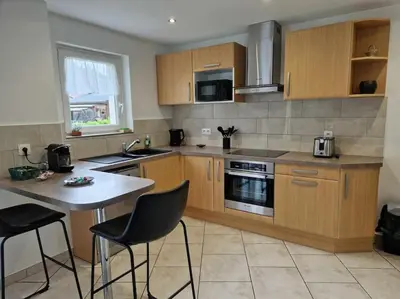 Cuisine ou kitchenette dans l'établissement Chez Katy