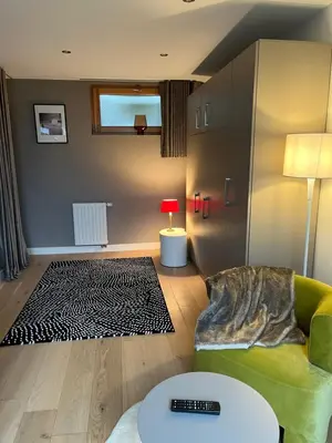 Coin salon dans l'établissement Suite Hôte Luxe 2 P Aux Vignes Lovées