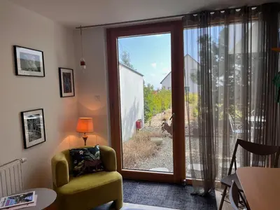 Coin salon dans l'établissement Suite Hôte Luxe 2 P Aux Vignes Lovées