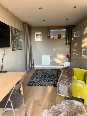 Coin salon dans l'établissement Suite Hôte Luxe 2 P Aux Vignes Lovées