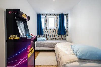 Coin salon dans l'établissement Enchantress'Apartment Designed By CM