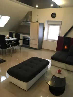 Cuisine ou kitchenette dans l'établissement La maison pailletée Giromagny