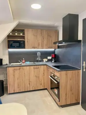 Cuisine ou kitchenette dans l'établissement Appartement cosy au centre-ville avec garage
