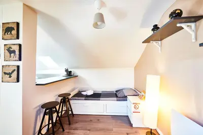 Un ou plusieurs lits dans un hébergement de l'établissement RM 3 Studio tout mignon 1 personne 3ème étage