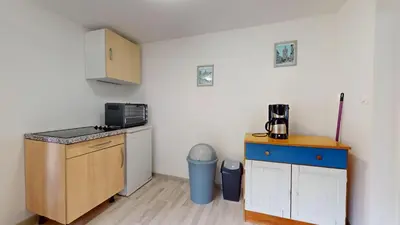Cuisine ou kitchenette dans l'établissement Le Bois Dormant 2