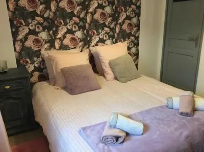 Un ou plusieurs lits dans un hébergement de l'établissement Villa 1950 Détente et Découvertes