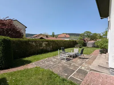 Jardin de l'établissement Gîte cosy au cœur de Gérardmer avec jardin et terrasse - FR-1-589-670
