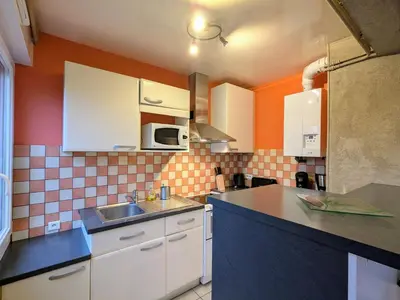 Cuisine ou kitchenette dans l'établissement Gîte cosy au cœur de Gérardmer avec jardin et terrasse - FR-1-589-670