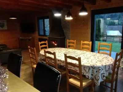 Coin salon dans l'établissement Superbe chalet Hautes Vosges
