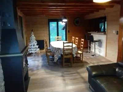 Coin salon dans l'établissement Superbe chalet Hautes Vosges
