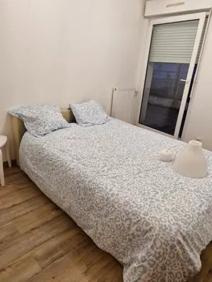Un ou plusieurs lits dans un hébergement de l'établissement Appartement 3 chambre 74m2