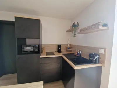 Cuisine ou kitchenette dans l'établissement La bulle Mathias