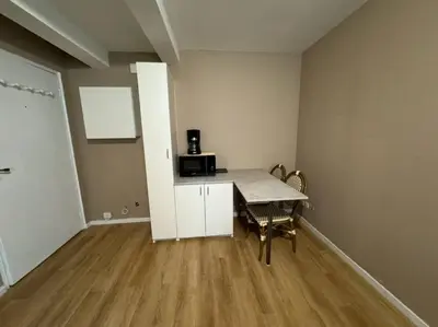 Cuisine ou kitchenette dans l'établissement Appartement proche place de la réunion au calme