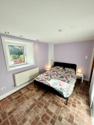 Un ou plusieurs lits dans un hébergement de l'établissement Chalet des roches - Plainfaing