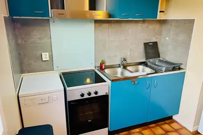 Cuisine ou kitchenette dans l'établissement Charming apartment with view of the Massif !