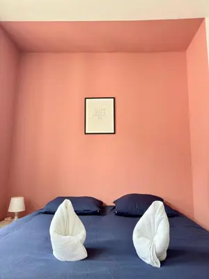 Un ou plusieurs lits dans un hébergement de l'établissement Cosy 2 - Montbéliard centre 80m2