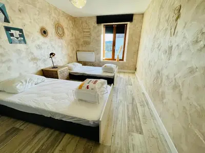 Un ou plusieurs lits dans un hébergement de l'établissement Maison 4-6 personnes proche Gerardmer