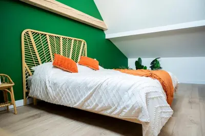 Un ou plusieurs lits dans un hébergement de l'établissement Villa La Perle Bleue