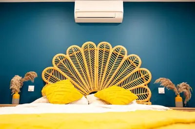 Un ou plusieurs lits dans un hébergement de l'établissement Villa La Perle Bleue