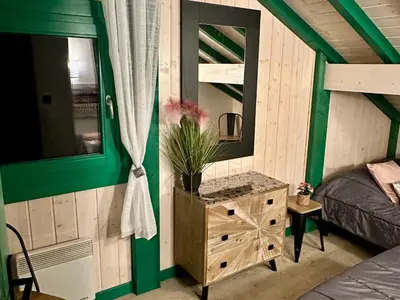 Un ou plusieurs lits dans un hébergement de l'établissement Chalet cosy dans les Hautes-Vosges avec spa - FR-1-589-673