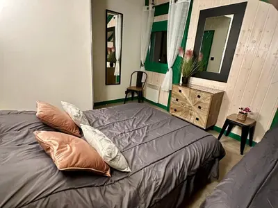 Un ou plusieurs lits dans un hébergement de l'établissement Chalet cosy dans les Hautes-Vosges avec spa - FR-1-589-673