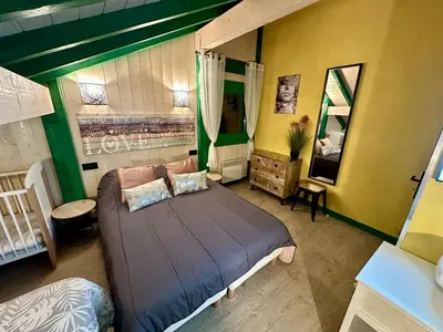 Un ou plusieurs lits dans un hébergement de l'établissement Chalet cosy dans les Hautes-Vosges avec spa - FR-1-589-673