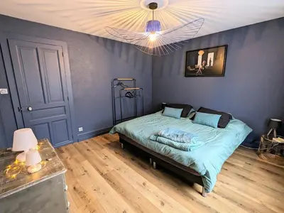 Un ou plusieurs lits dans un hébergement de l'établissement Appartement rénové avec jardin, parking et WiFi à Gérardmer - FR-1-589-678