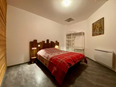 Un ou plusieurs lits dans un hébergement de l'établissement Appartement moderne à La Bresse, 2 chambres, accès PMR - FR-1-589-687