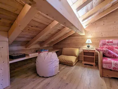 Coin salon dans l'établissement Chalet au cœur des Vosges avec sauna, terrasse et connexion WIFI - FR-1-589-692