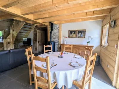 Coin salon dans l'établissement Chalet au cœur des Vosges avec sauna, terrasse et connexion WIFI - FR-1-589-692