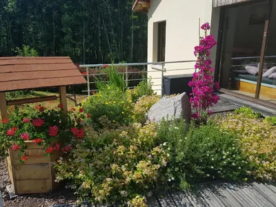 Jardin de l'établissement Chambre spacieuse avec balcon et accès piscine chauffée - FR-1-589-701