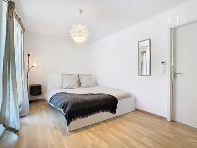 Un ou plusieurs lits dans un hébergement de l'établissement Appartement de charme neuf