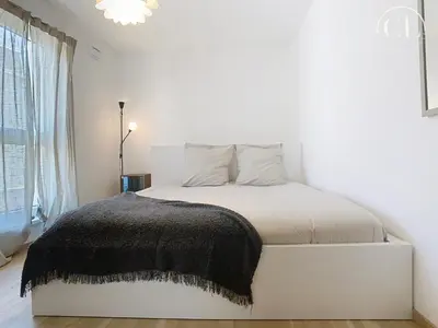 Un ou plusieurs lits dans un hébergement de l'établissement Appartement de charme neuf