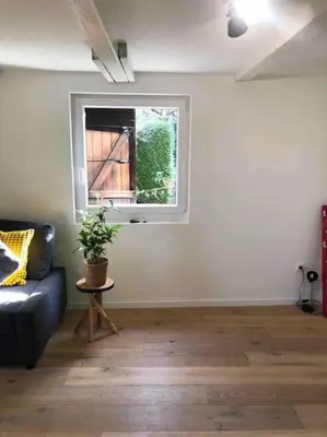 Coin salon dans l'établissement Amelie - petite maison alsacienne