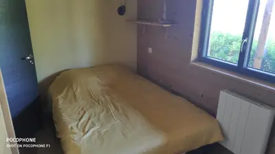 Un ou plusieurs lits dans un hébergement de l'établissement Chalet avec vue sur la vallée