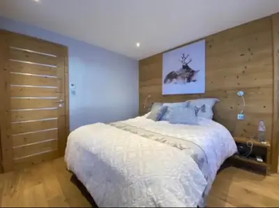 Un ou plusieurs lits dans un hébergement de l'établissement Chalet Solie