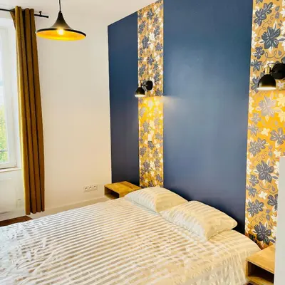 Un ou plusieurs lits dans un hébergement de l'établissement 201 - Appartement confortable face à la Maison du Peuple