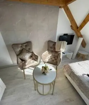 Coin salon dans l'établissement Esprit Palace, coeur de Mulhouse