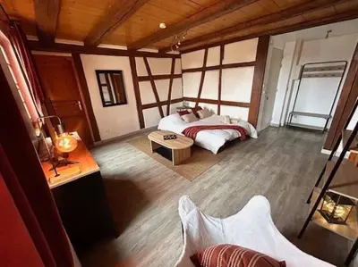 Un ou plusieurs lits dans un hébergement de l'établissement Le Rustique - le charme alsacien du vignoble