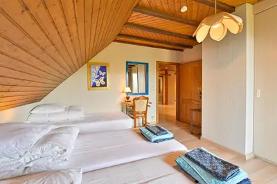 Un ou plusieurs lits dans un hébergement de l'établissement Maison de charme Haslach 300m2 Grand séjour 15 personnes - Belles vues !
