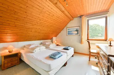 Un ou plusieurs lits dans un hébergement de l'établissement Maison de charme Haslach 300m2 Grand séjour 15 personnes - Belles vues !