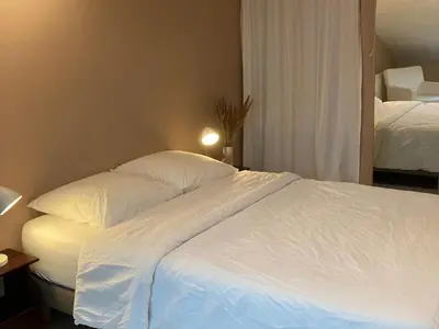 Un ou plusieurs lits dans un hébergement de l'établissement Gîte montagnard confortable avec terrasse et WIFI - FR-1-589-751